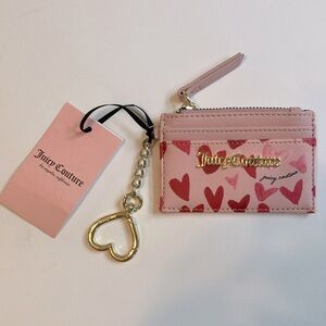 Small wallet. Colorful pink and red hearts. Brand new with tags. Juicy Couture
